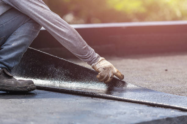 Professional Basement Waterproofing technician working in Marcellus, NY